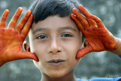 Circumcised boy - normally parent paint limbs with hena 